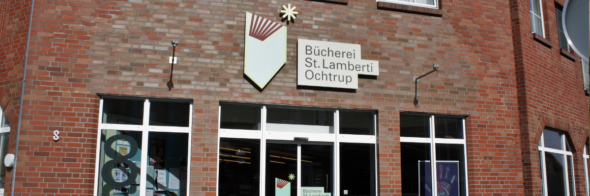 Eingang der Lambertibücherei mit Schriftzug und Logo