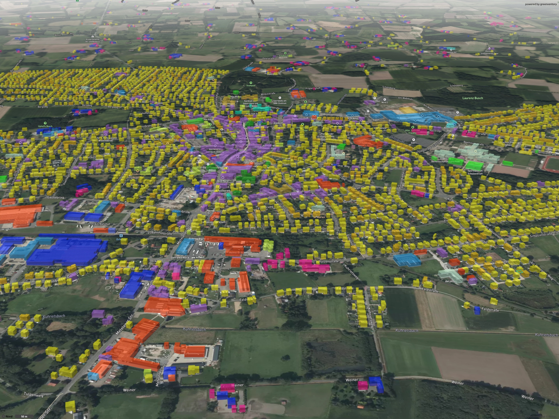 Sie sehen: eine Luftansicht von Ochtrup mit farblich gekennzeichneten Liegenschaften, die die verschiedenen Eignungsbereiche für die kommunale Wärmeplanung darstellen.